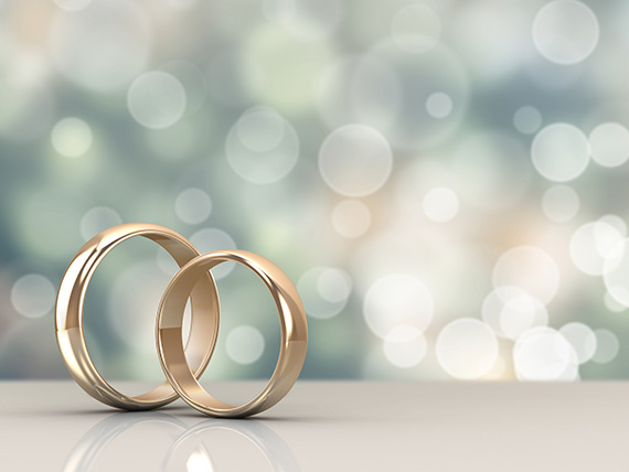 Image of wedding rings on table